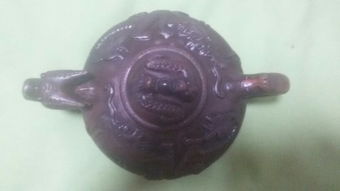 紫砂壶工艺品的价格解析 以37厘米×36厘米为例